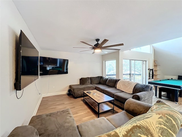 living room with ceiling fan, light hardwood / wood-style floors, and billiards