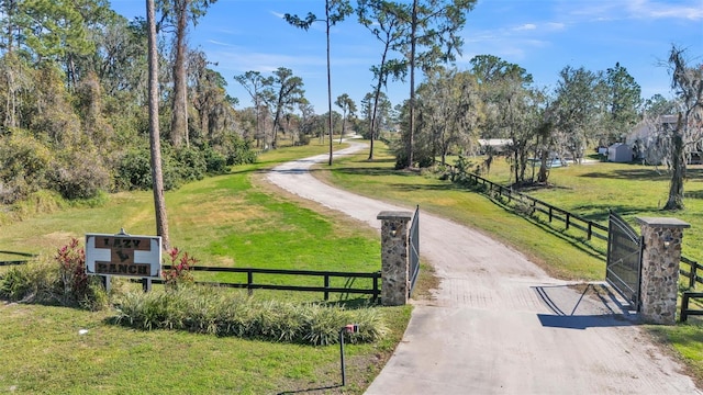 view of home's community featuring a lawn