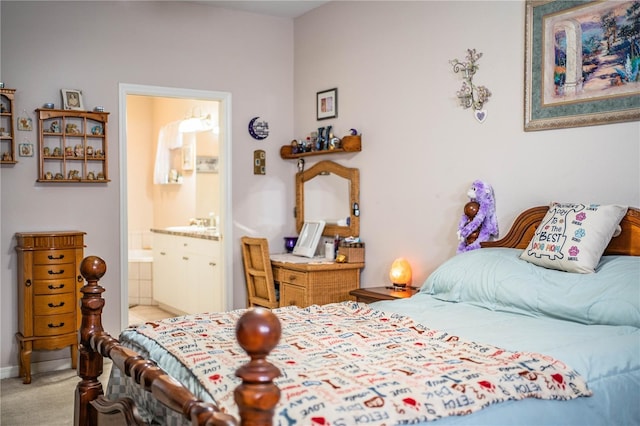 carpeted bedroom featuring ensuite bathroom