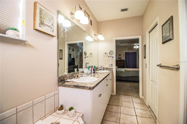 bathroom with vanity, tile patterned floors, and ceiling fan