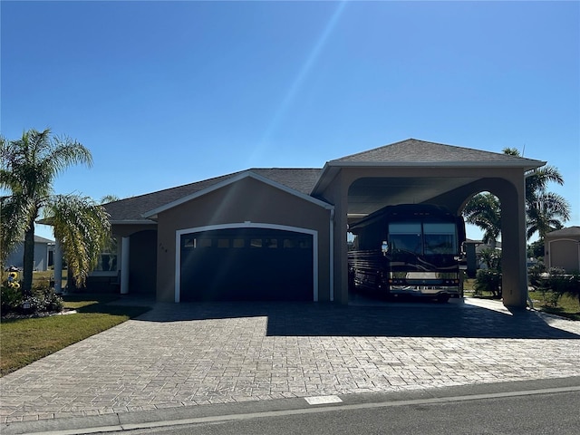 ranch-style home featuring a garage