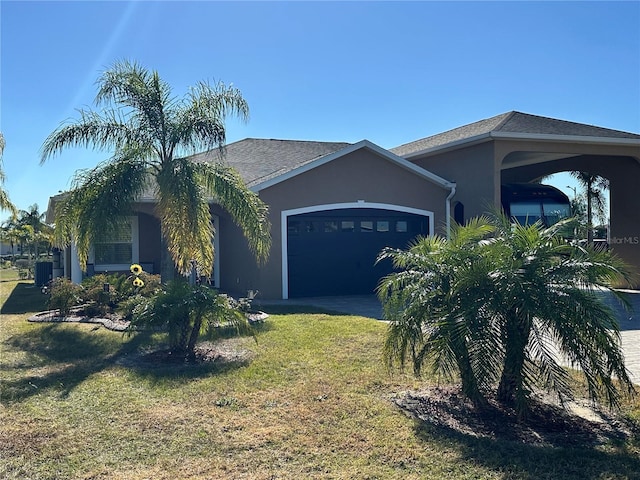 view of home's exterior with a garage and a yard