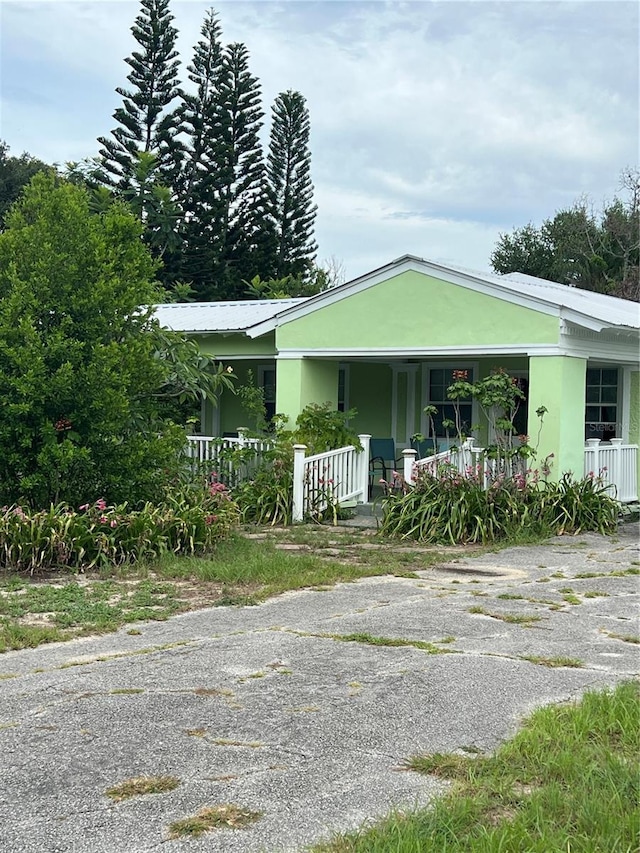 view of front of home featuring covered porch