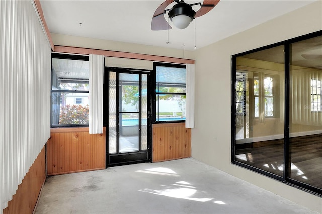 unfurnished room featuring ceiling fan