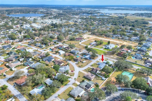 drone / aerial view with a water view