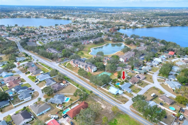 drone / aerial view with a water view