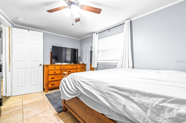 tiled bedroom with ceiling fan, ornamental molding, and a textured ceiling