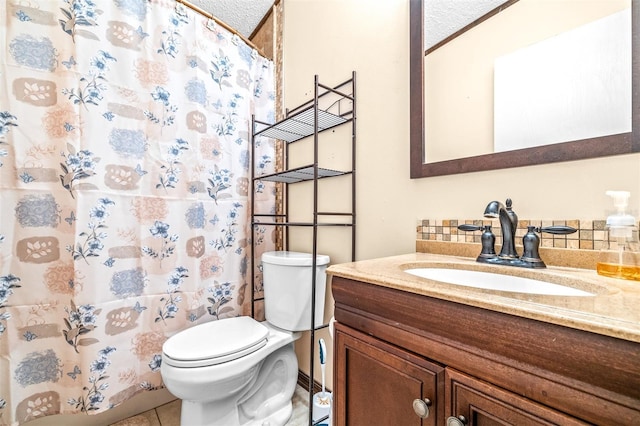 bathroom featuring vanity, tile patterned flooring, toilet, and a shower with shower curtain