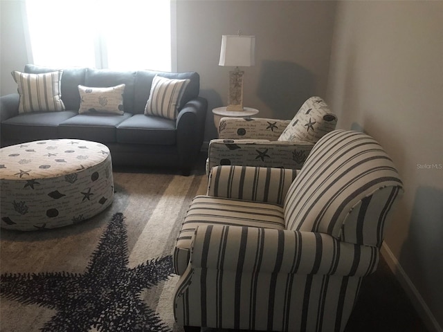 sitting room featuring baseboards