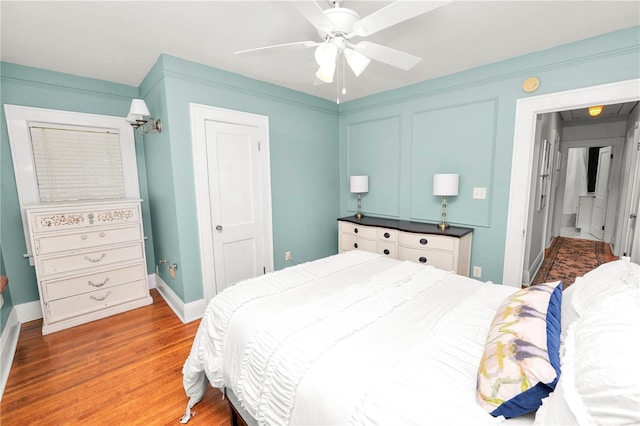 bedroom featuring ceiling fan and light wood-type flooring