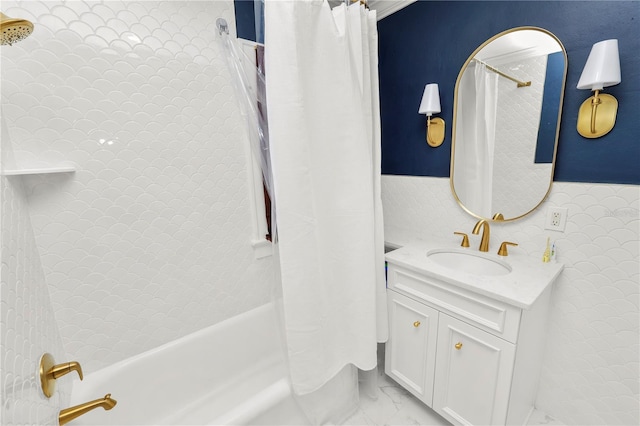 bathroom featuring vanity and shower / bath combo