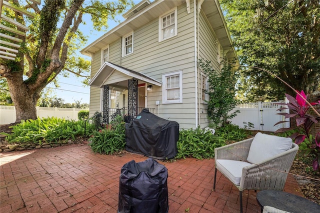 view of patio with a grill