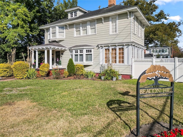 view of front of home with a front yard