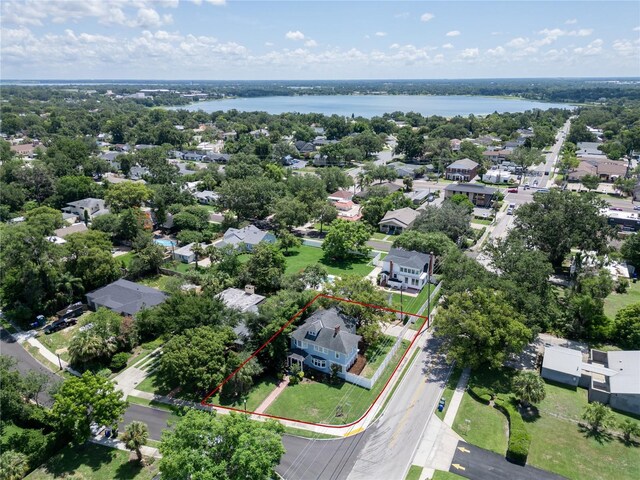 2016 Seminole Trl, Lakeland, FL 33803 - aerial perspective of suburban area with property boundaries highlighted and a large body of water