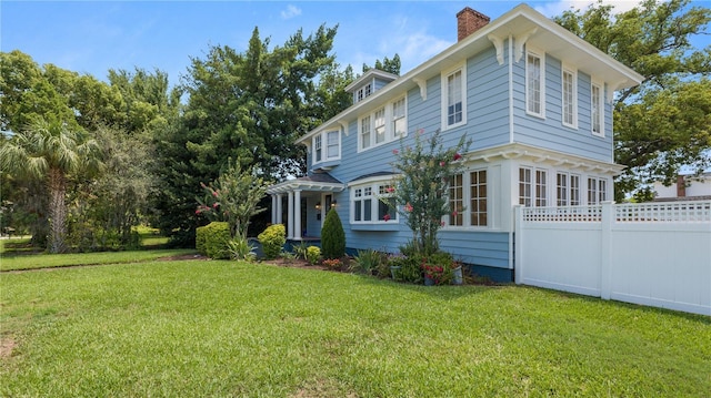 2016 Seminole Trl, Lakeland, FL 33803 - view of property exterior featuring a chimney
