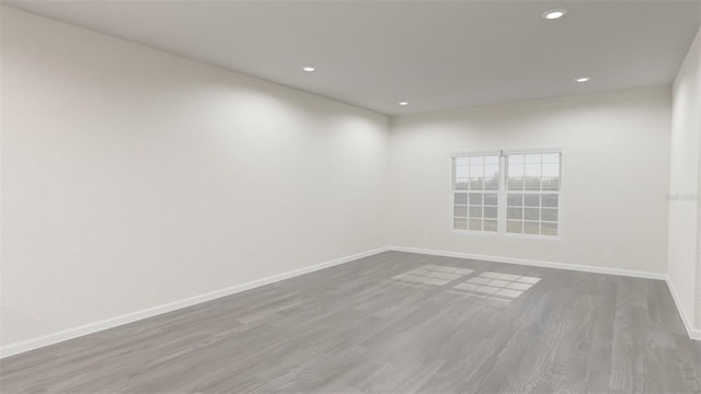 empty room featuring hardwood / wood-style floors