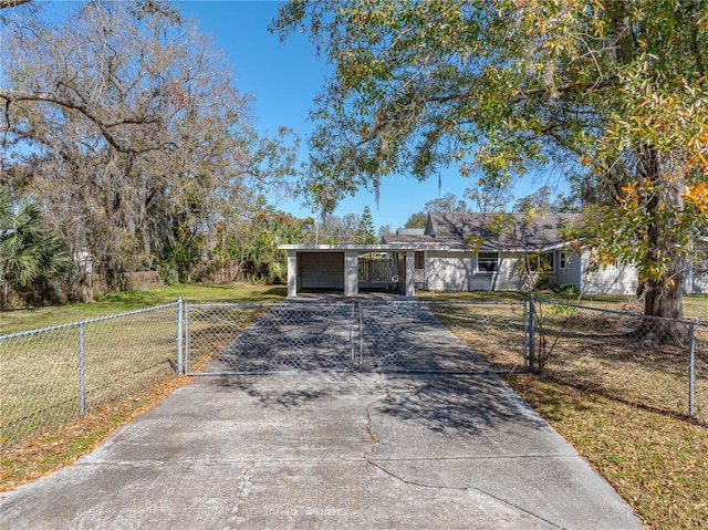 ranch-style house with a carport and a front yard