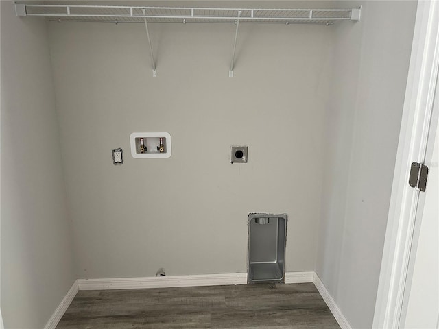 laundry area with washer hookup, dark hardwood / wood-style floors, electric dryer hookup, and gas dryer hookup