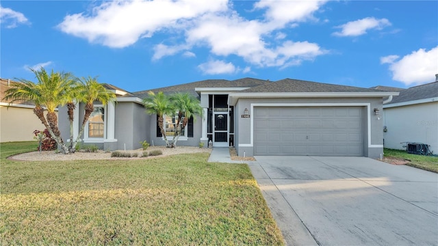 ranch-style home featuring a garage and a front lawn