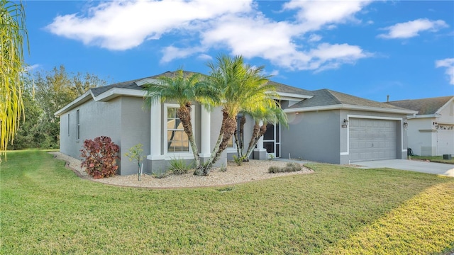 ranch-style home with a garage and a front lawn