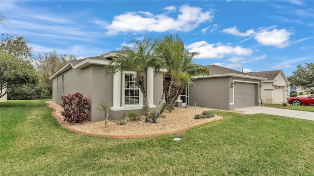 view of front facade featuring a garage, stucco siding, concrete driveway, and a front yard