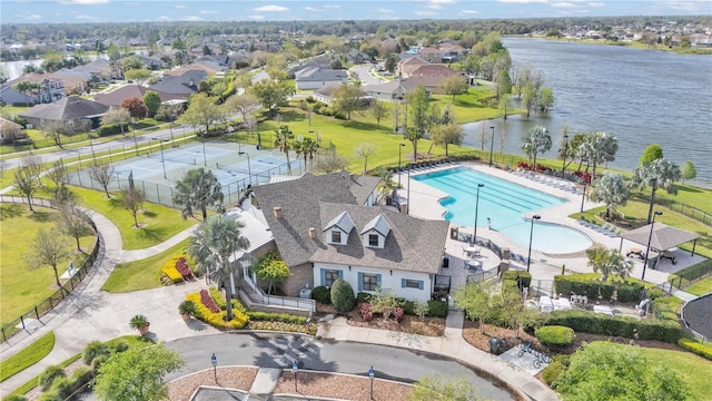 aerial view with a water view and a residential view