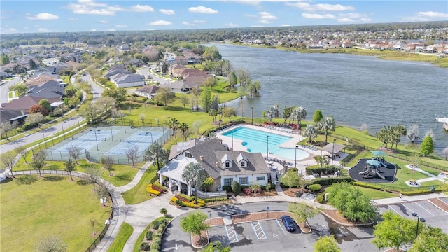 aerial view with a residential view and a water view