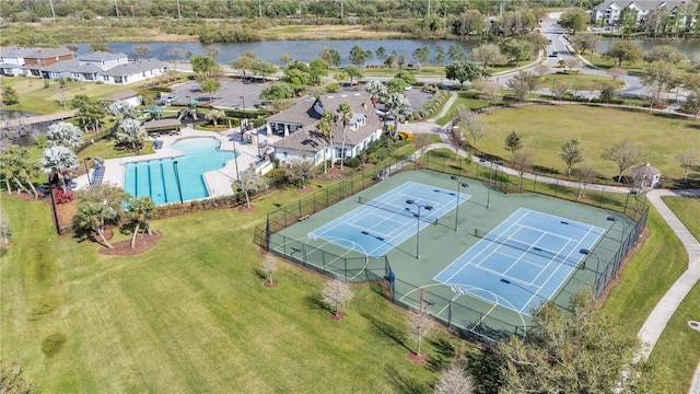 aerial view with a residential view and a water view