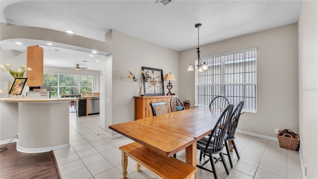 dining room with light tile patterned floors, visible vents, recessed lighting, and baseboards