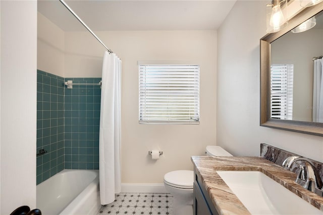 full bathroom with vanity, toilet, and shower / tub combo