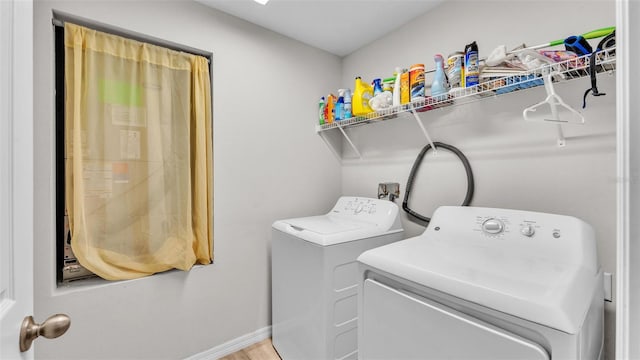 laundry area featuring washing machine and dryer