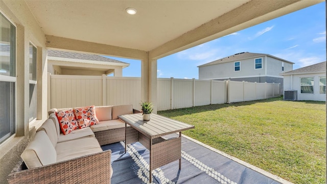 exterior space with outdoor lounge area and central AC