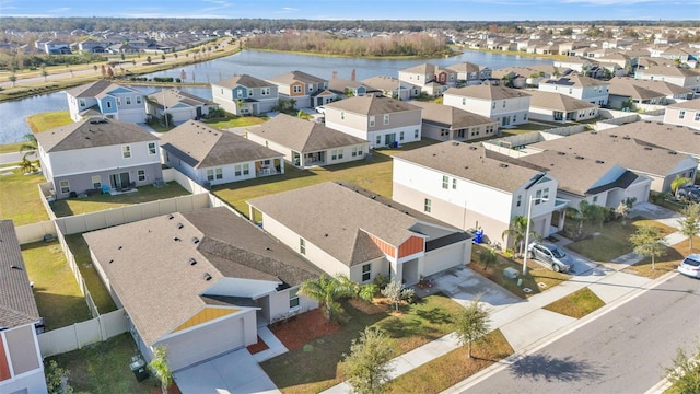 bird's eye view with a water view