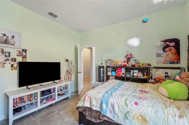 bedroom with a textured ceiling