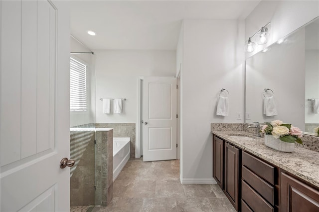 bathroom with vanity and plus walk in shower