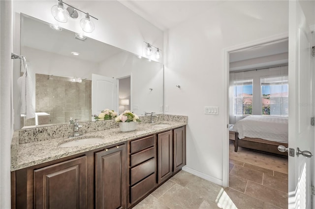 bathroom featuring vanity and walk in shower