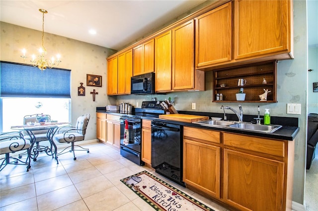 kitchen featuring sink, a notable chandelier, black appliances, light tile patterned flooring, and decorative light fixtures