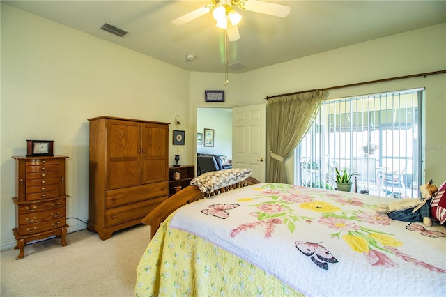 bedroom with light carpet and ceiling fan