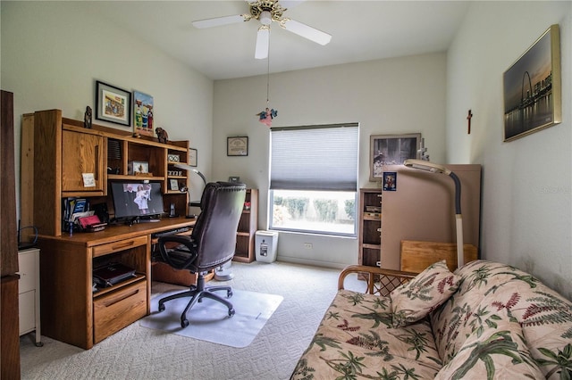 home office featuring light colored carpet and ceiling fan