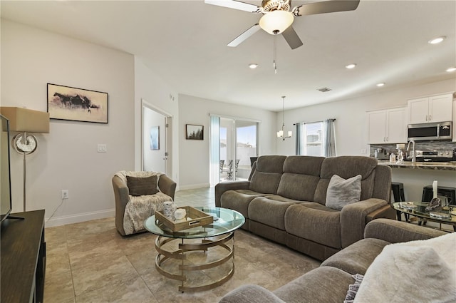 living room with ceiling fan