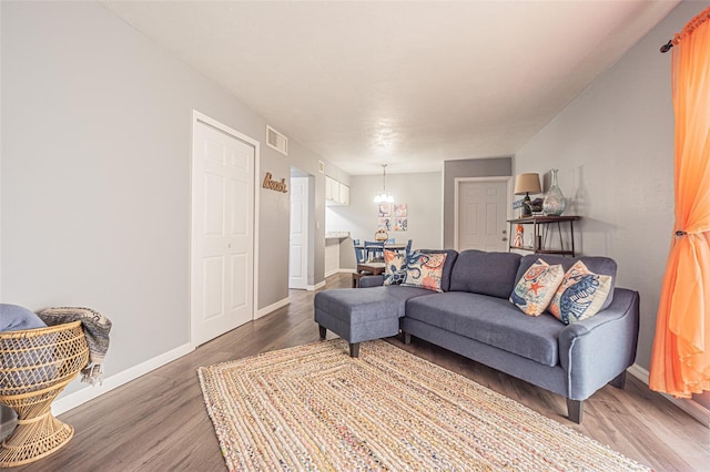 living room with dark hardwood / wood-style flooring