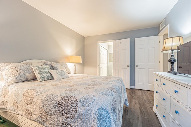 bedroom featuring dark wood-type flooring