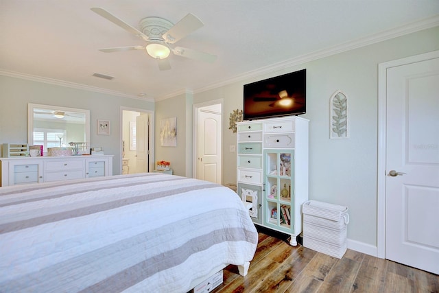 bedroom with ornamental molding, ceiling fan, and light wood-type flooring