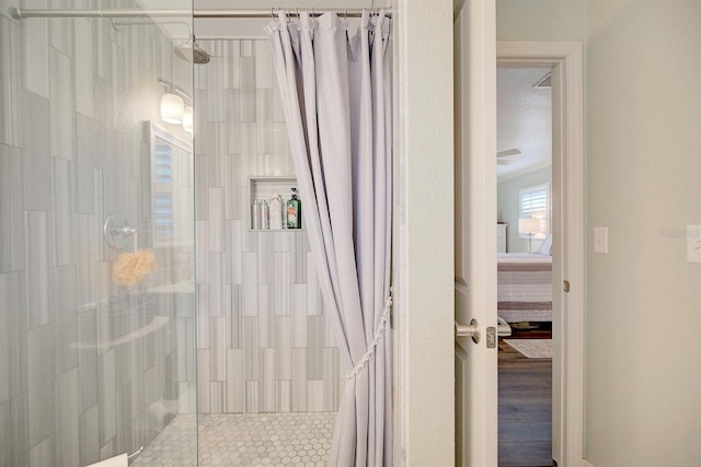 bathroom with curtained shower