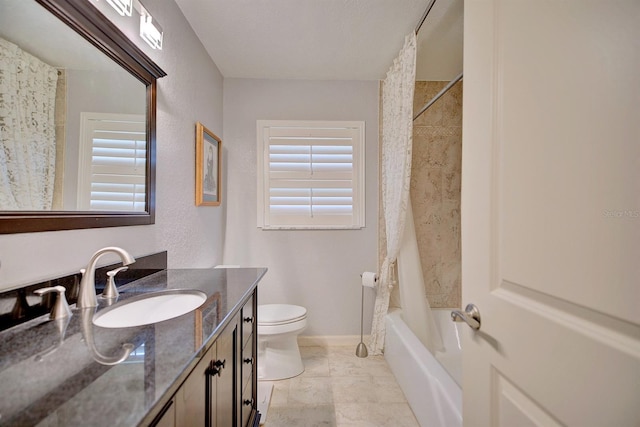 full bathroom featuring vanity, toilet, and shower / tub combo