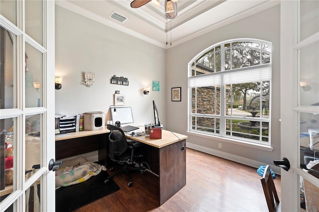 office space featuring crown molding, plenty of natural light, and french doors