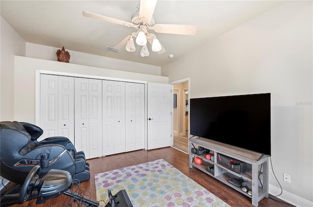 interior space featuring dark hardwood / wood-style floors and ceiling fan