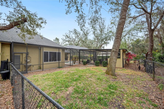 view of yard featuring a lanai