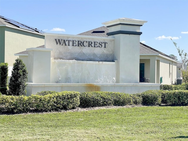 community sign with a lawn