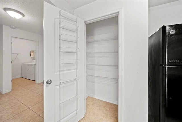 pantry with independent washer and dryer